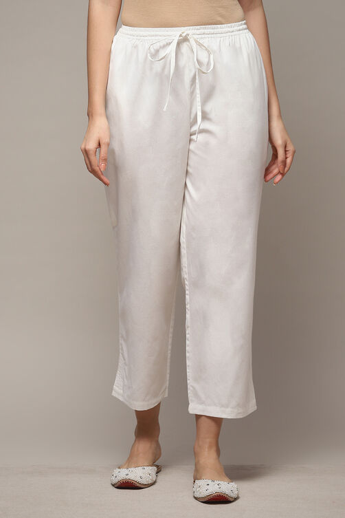 Off White Cotton Solid Pants image number 1