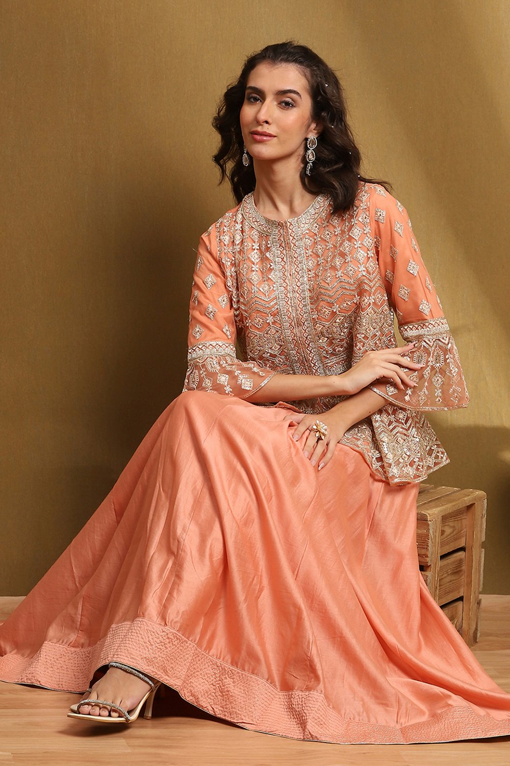 Peach Net Embroidered Peplum Kurta Lehenga Set image number 0