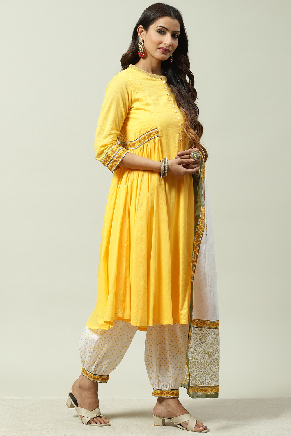 Yellow Cotton Flared Kalidar Kurta Slim Pant Suit Set image number 6