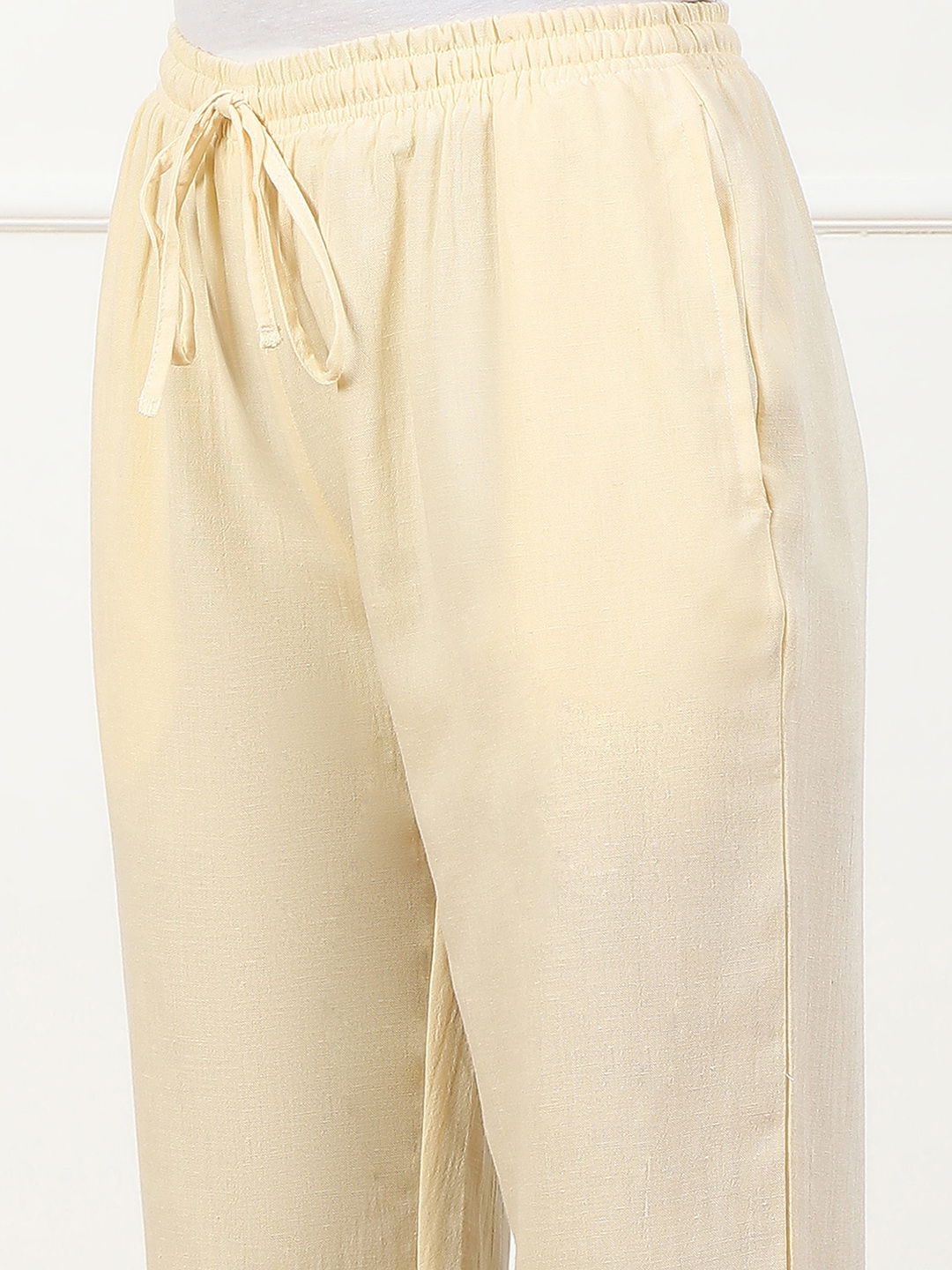 Cream-coloured Solid Mid-Rise Regular Fit Palazzo image number 1